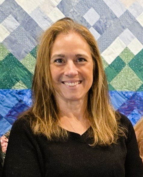 Smiling staff member at assisted living facility