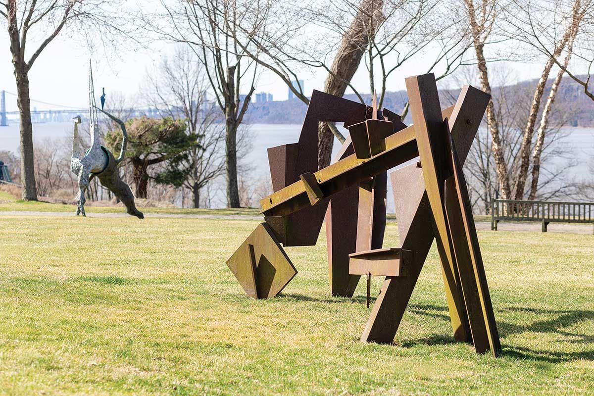 Outdoor sculpture in a scenic park setting