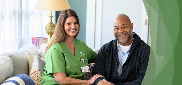Staff member with resident in a common area.