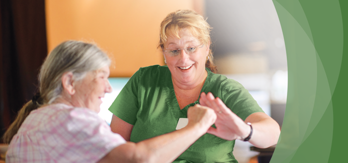 Staff member engaging with a resident.