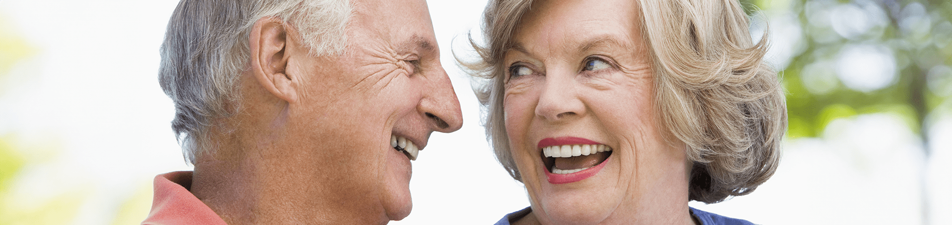 Smiling elderly couple enjoying each other's company
