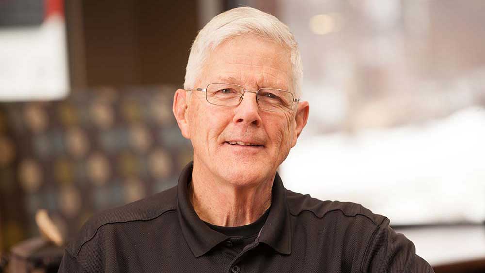 Smiling senior man in casual attire