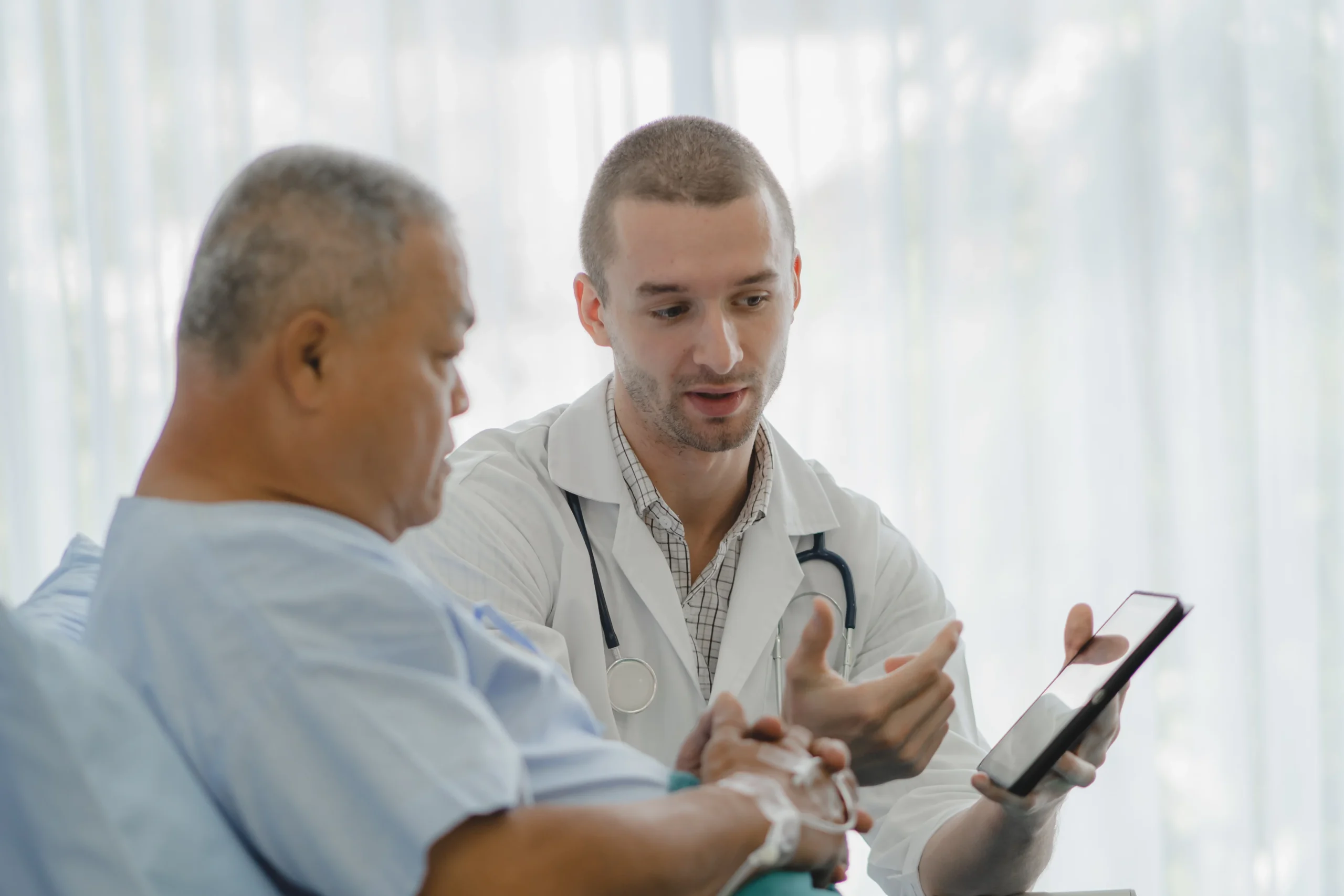 Doctor discussing with a senior patient.