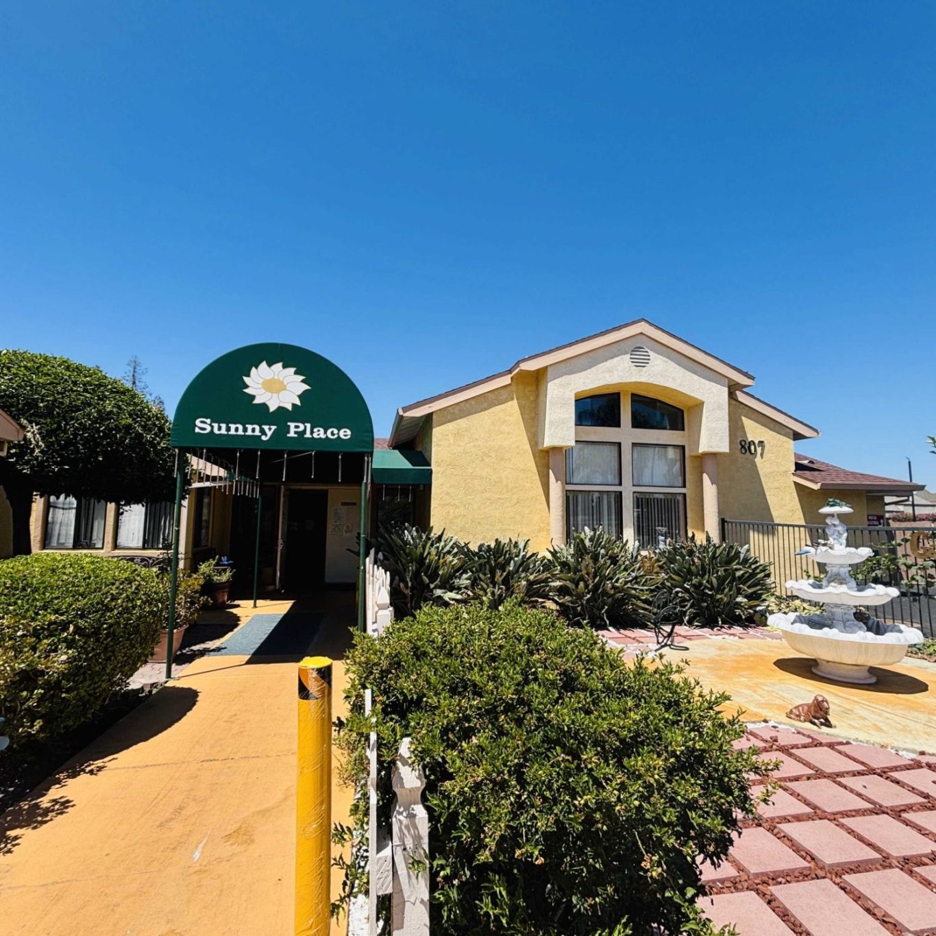 Exterior view of Sunny Place building entrance