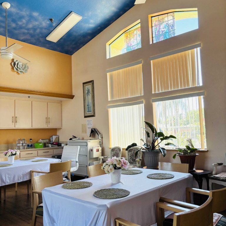 Bright dining area with tables and plants