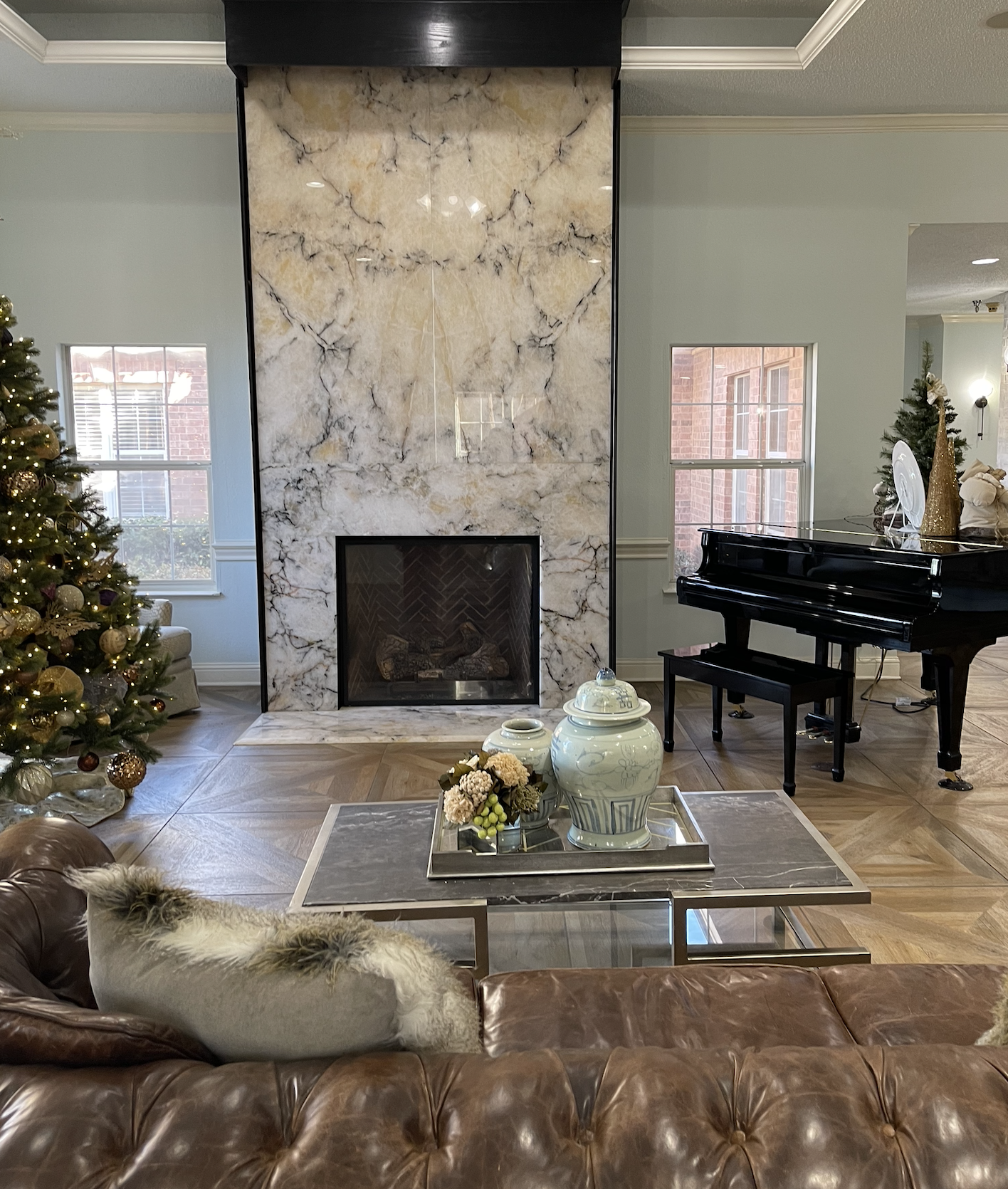 Cozy common area with fireplace and decorations.