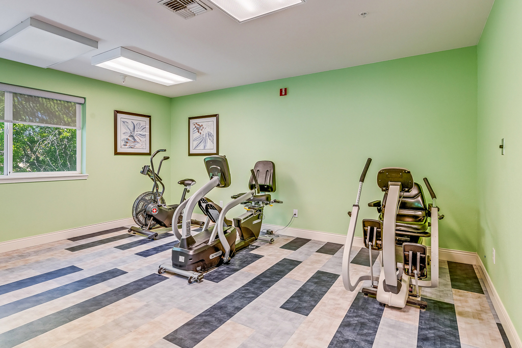 Modern fitness room with exercise equipment