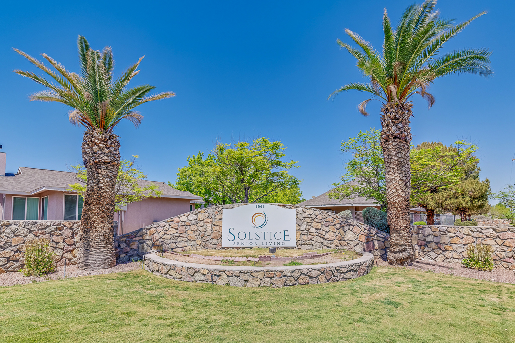 Exterior view of Solstice Senior Living at Rio Norte with palm trees