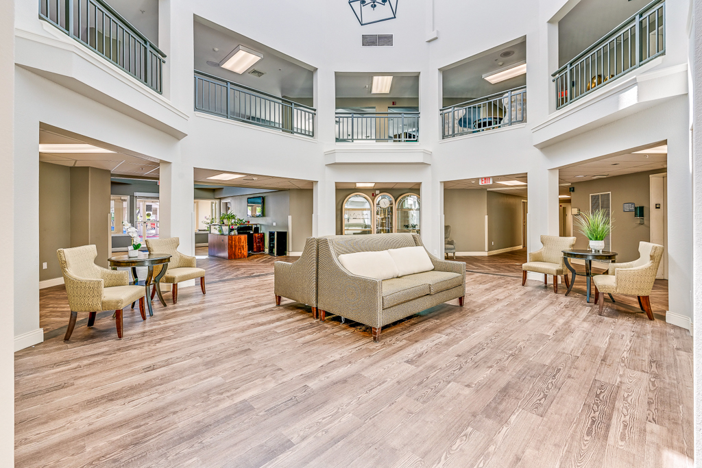 Bright common area with seating and modern decor