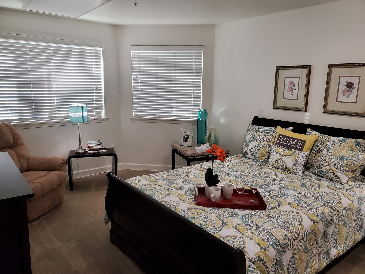 Cozy resident room with a bed and chair