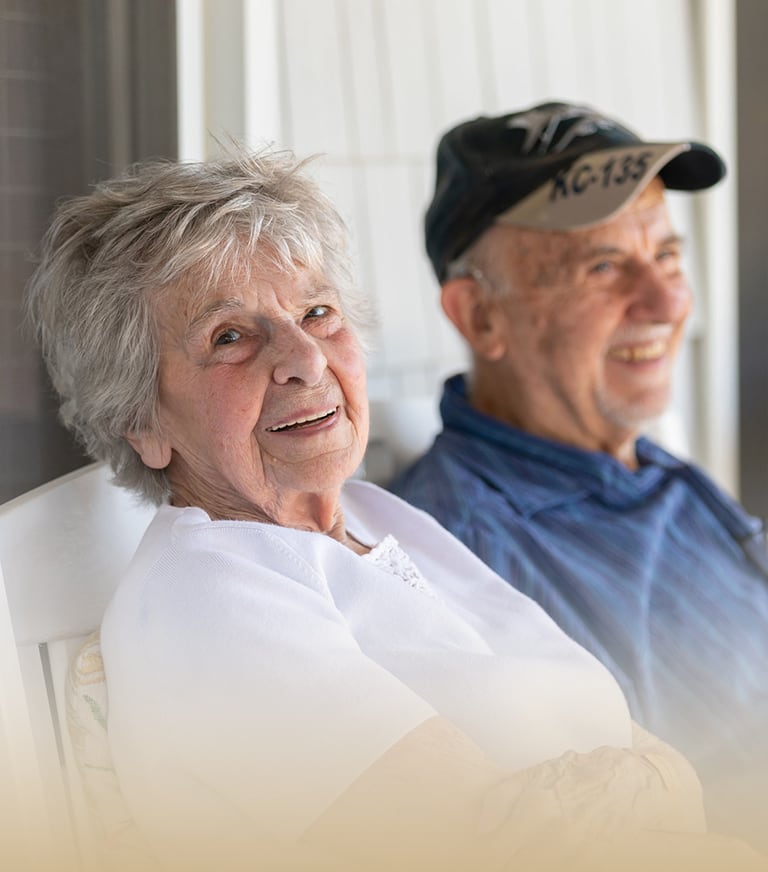 Two residents enjoying time together outdoors