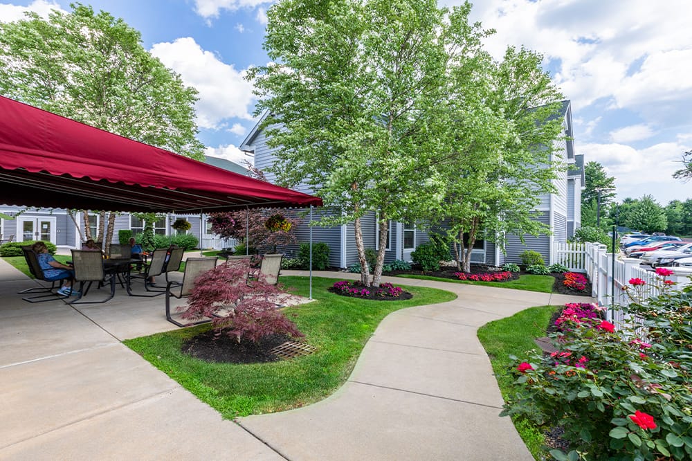 Outdoor seating area with landscaped gardens