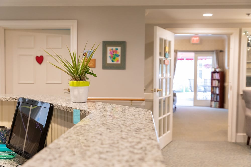 Warm, inviting lobby area with indoor plants