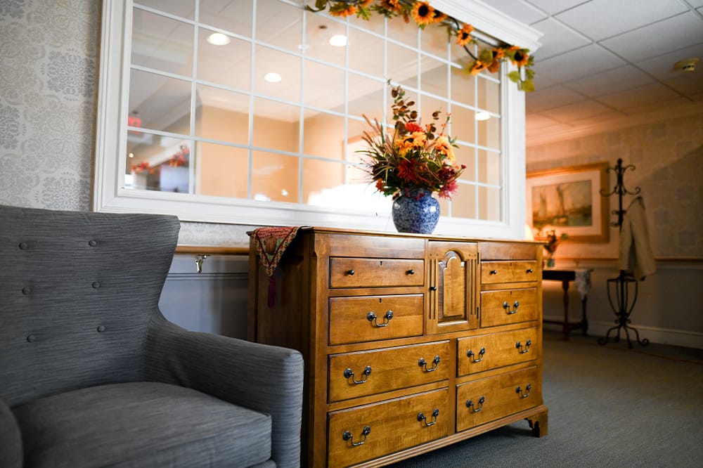 Interior view of a common area with a floral arrangement