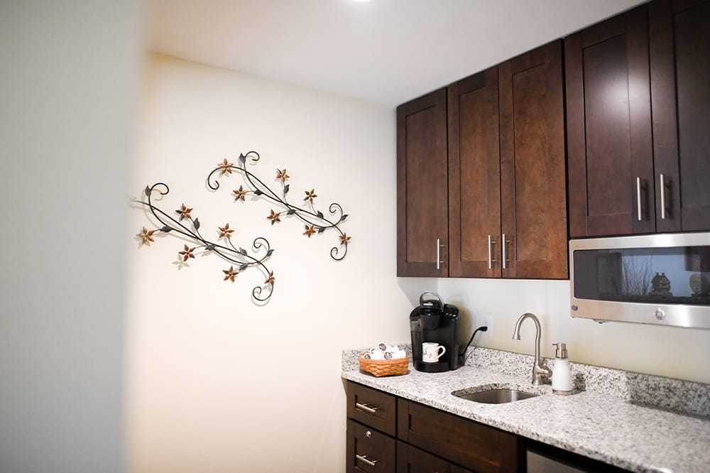 Well-decorated kitchenette area with modern features