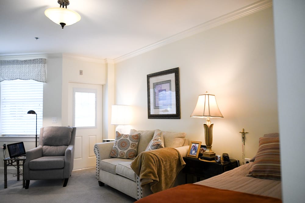 Cozy interior of a private resident room with furniture