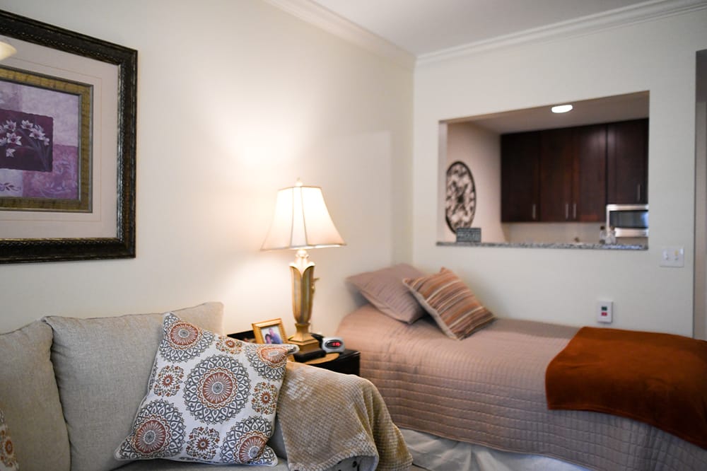 Cozy interior view of a resident room with bedding