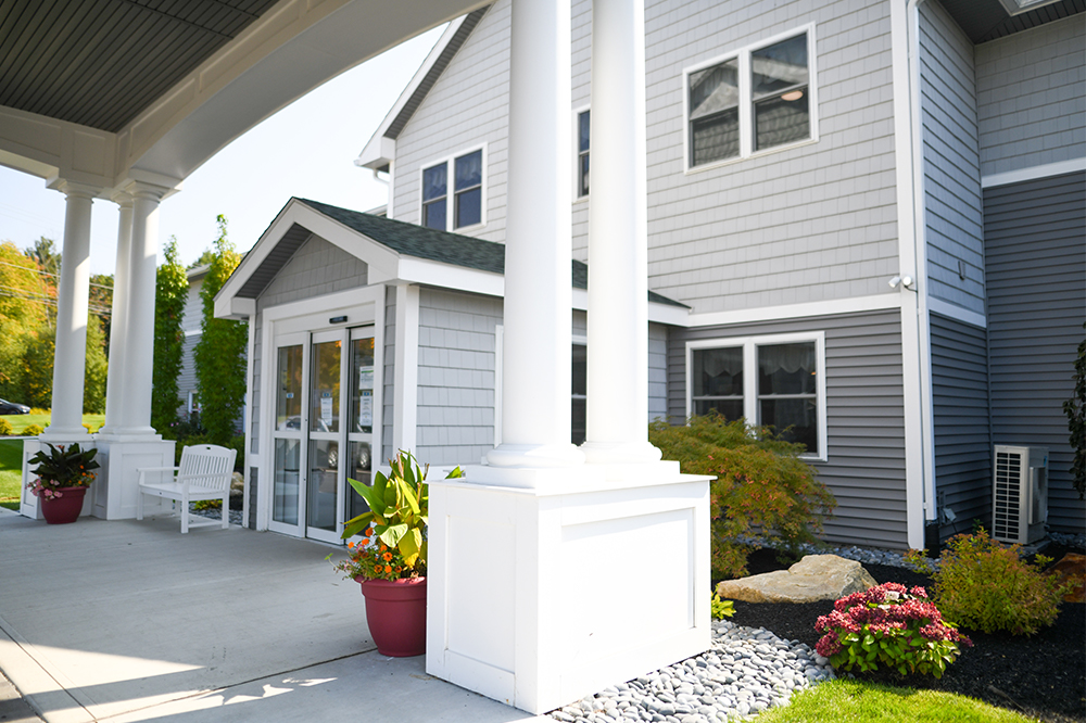 Exterior view of the facility entrance with landscaping