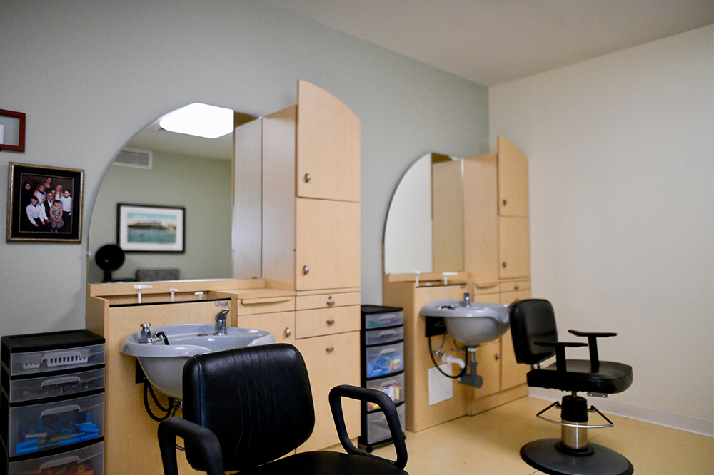 Interior of a salon with styling chairs and mirrors