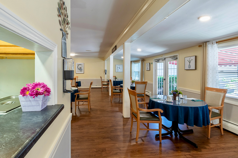 Cozy dining area with tables and chairs