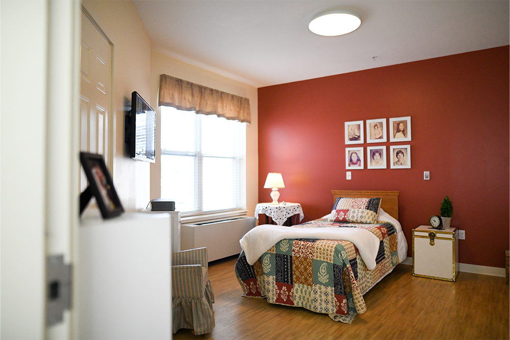 Comfortable resident room with colorful decor