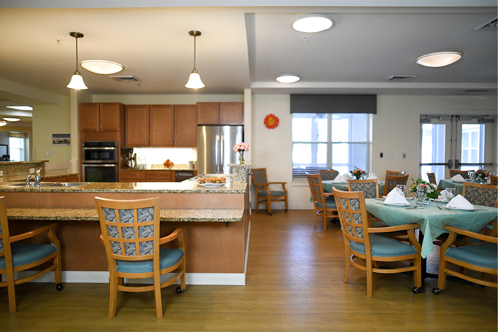 Interior view of a dining area with tables and chairs