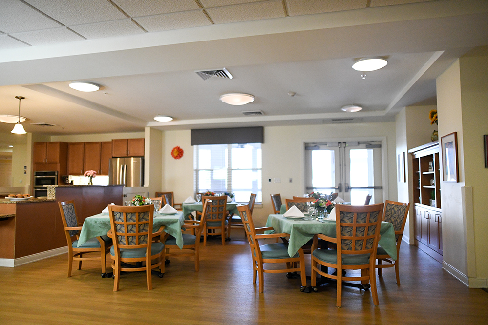 Interior dining room with tables set for meals
