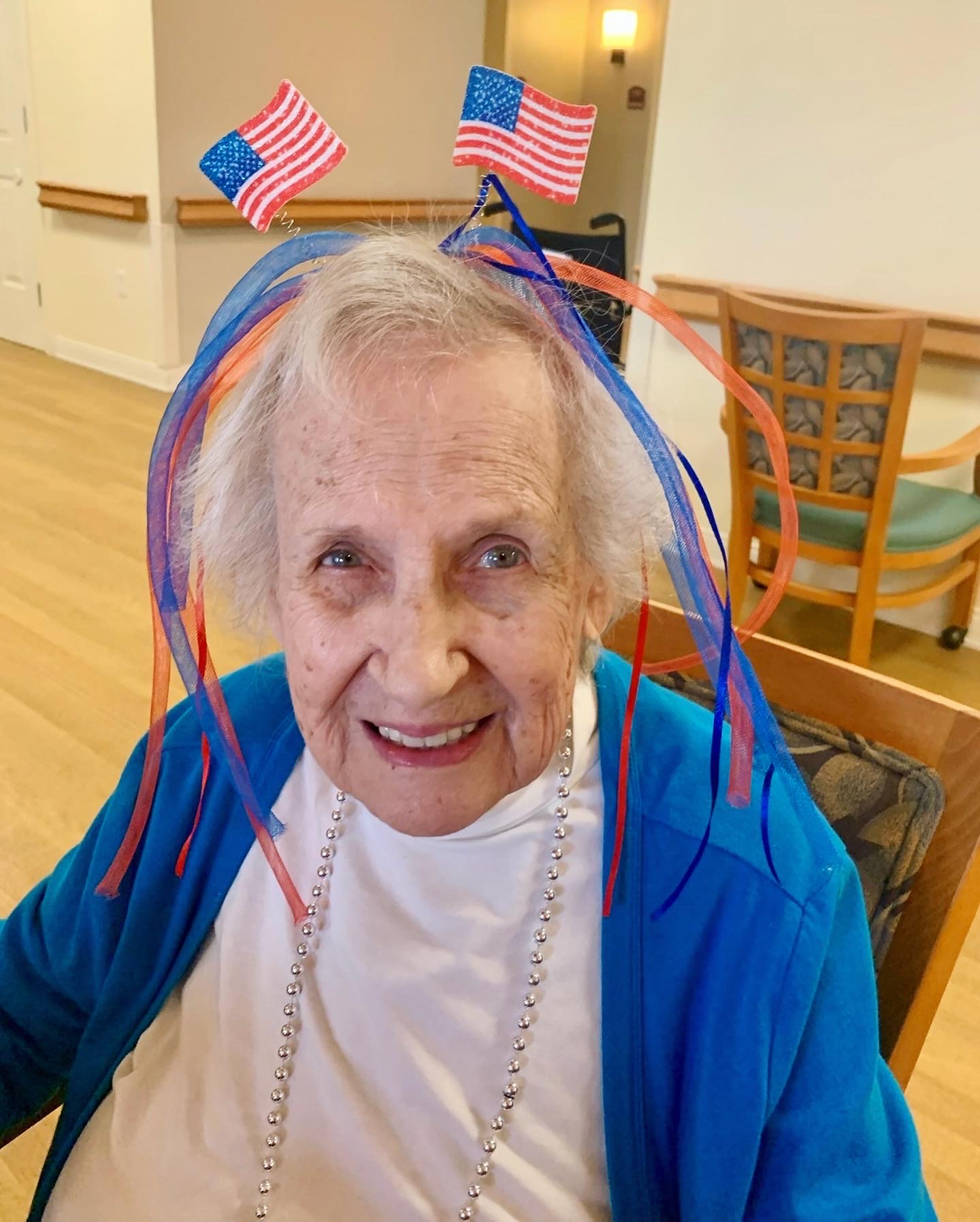 Resident celebrating with festive hair accessories