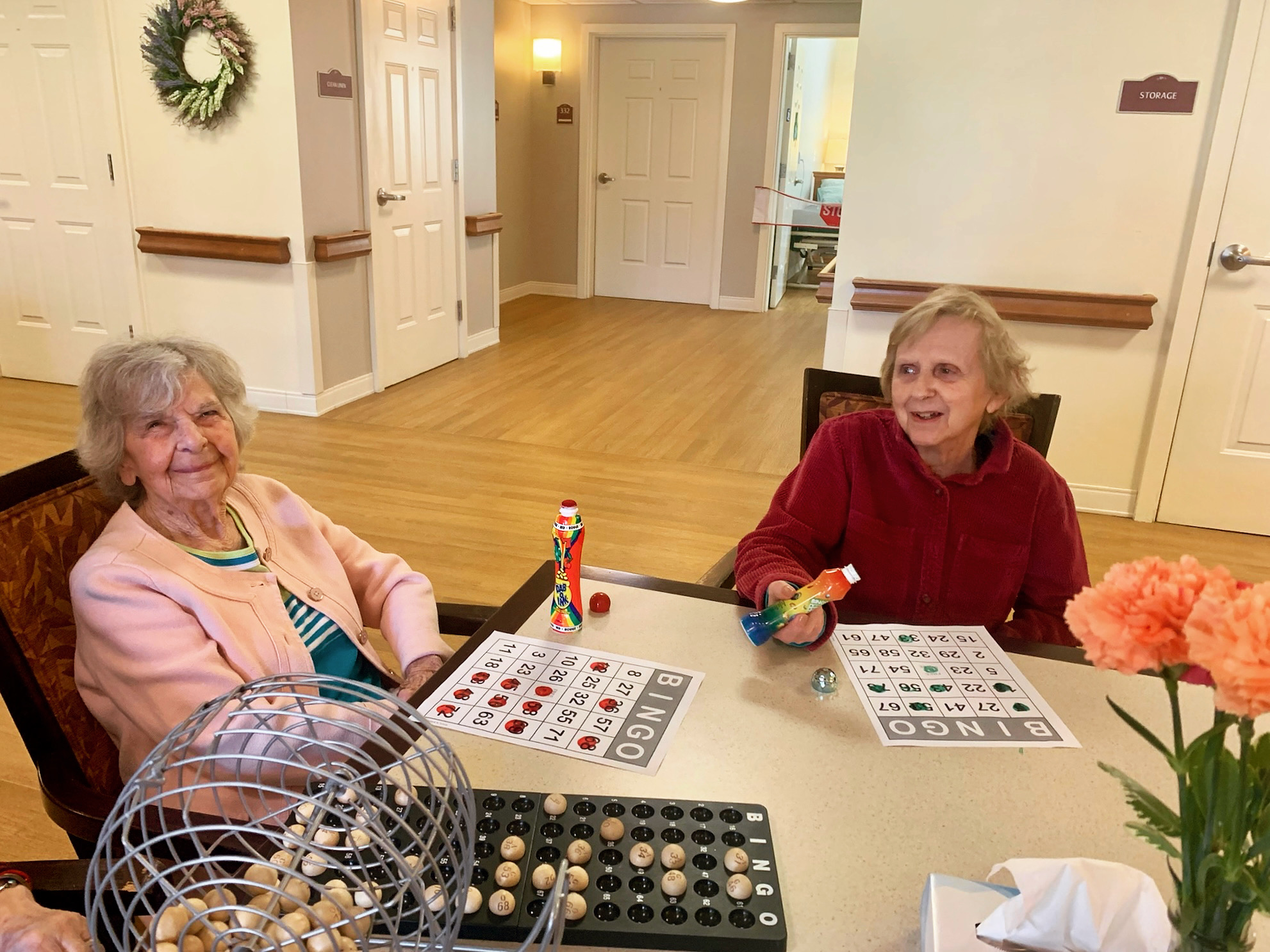 Residents playing bingo in a common area