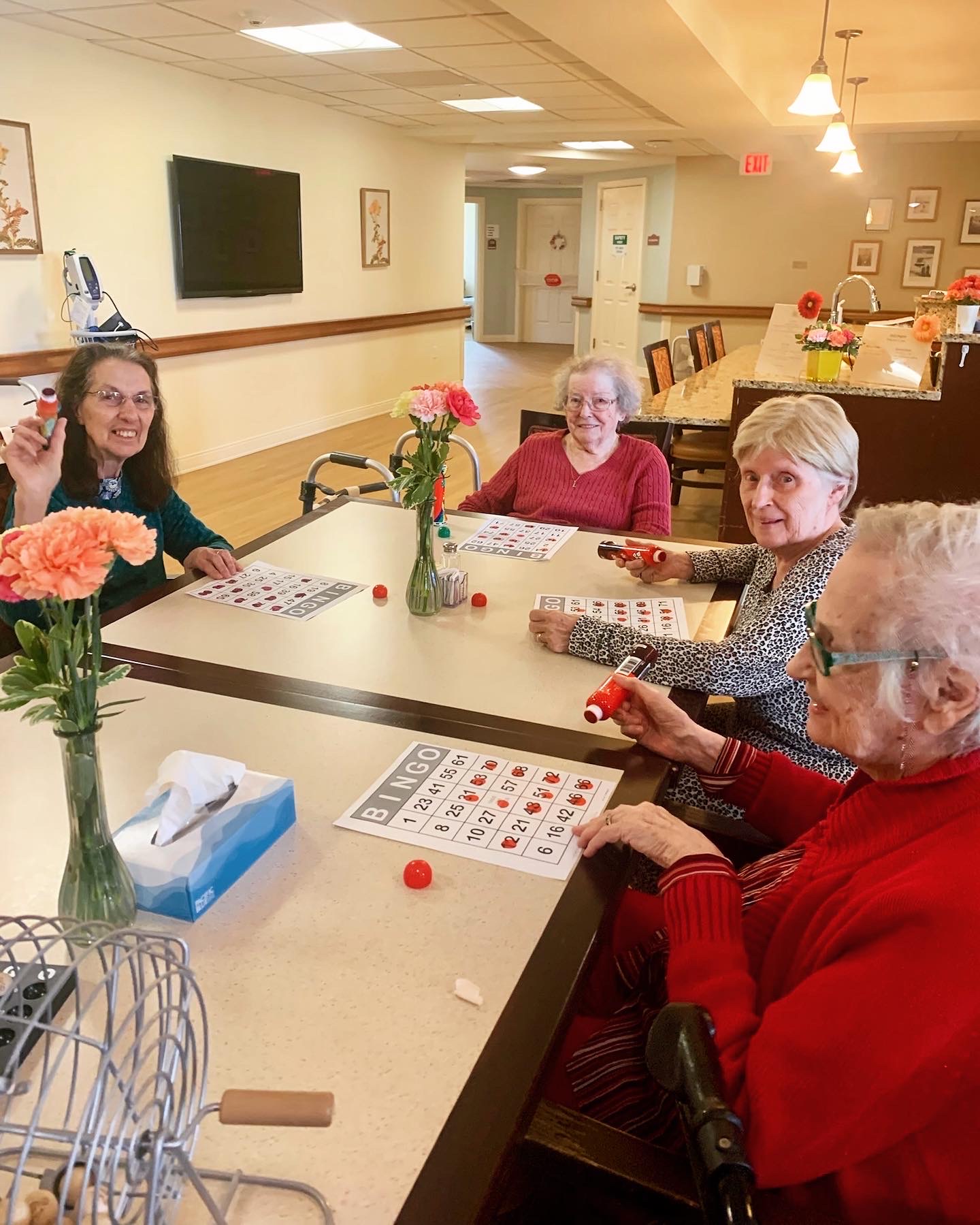 Residents playing bingo in a common area