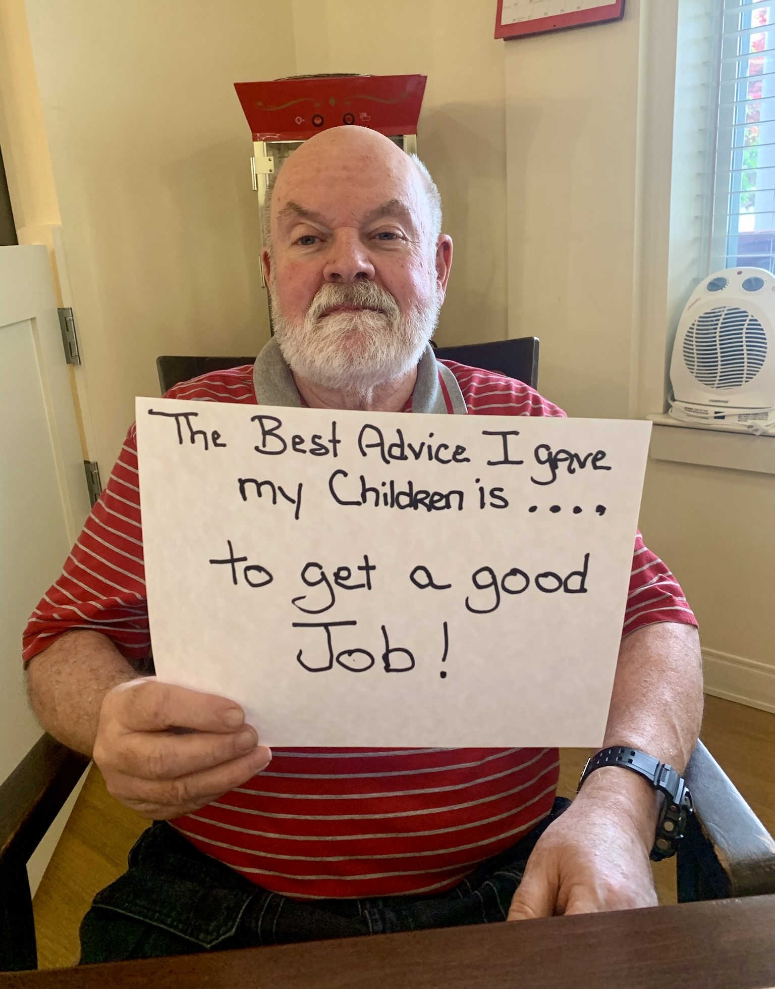Resident holding a sign with advice for children
