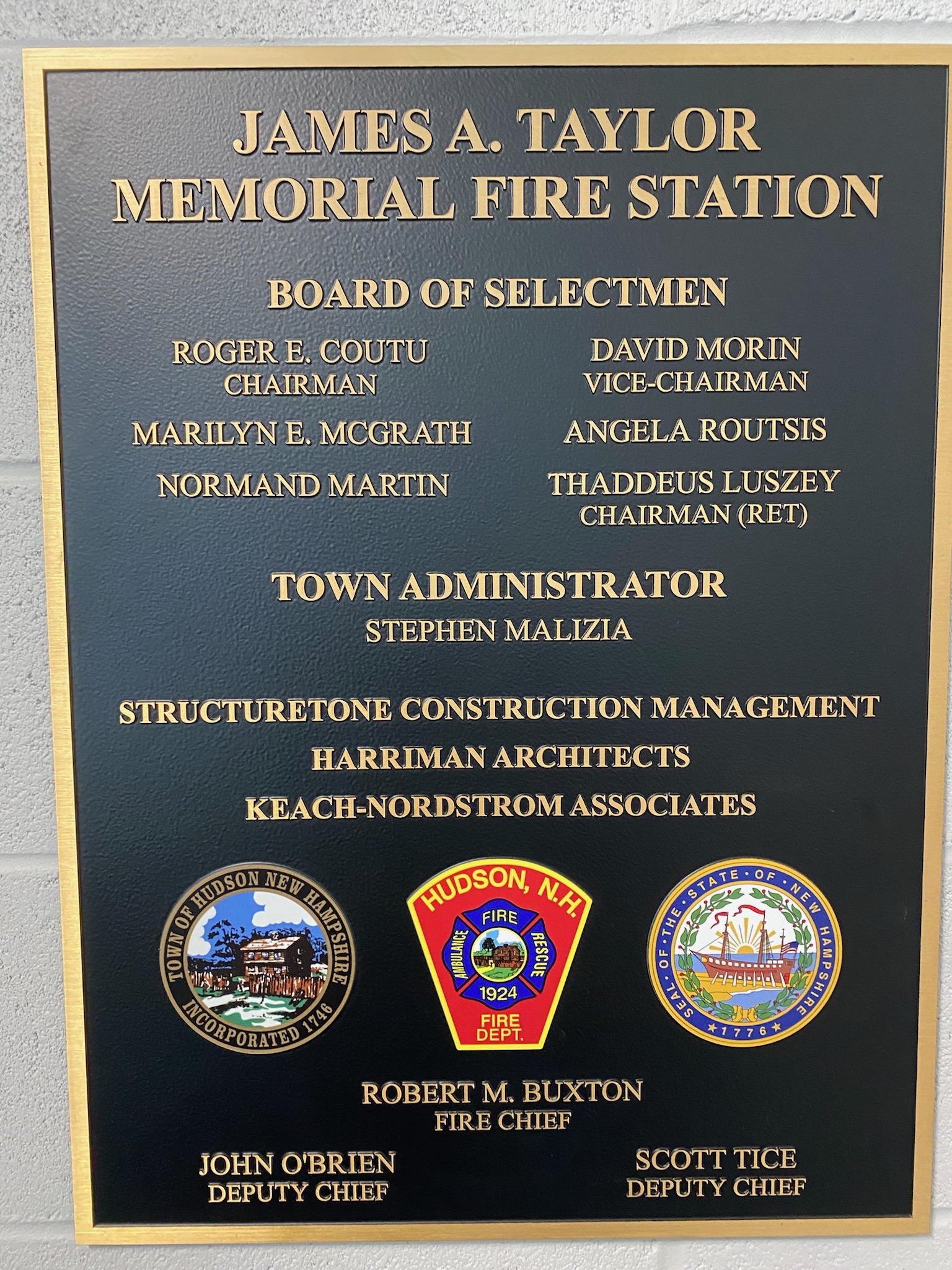 Plaque listing fire station board and members