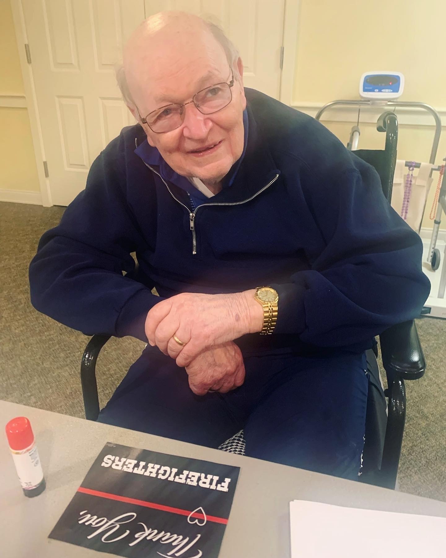 Senior resident enjoying an activity at a table