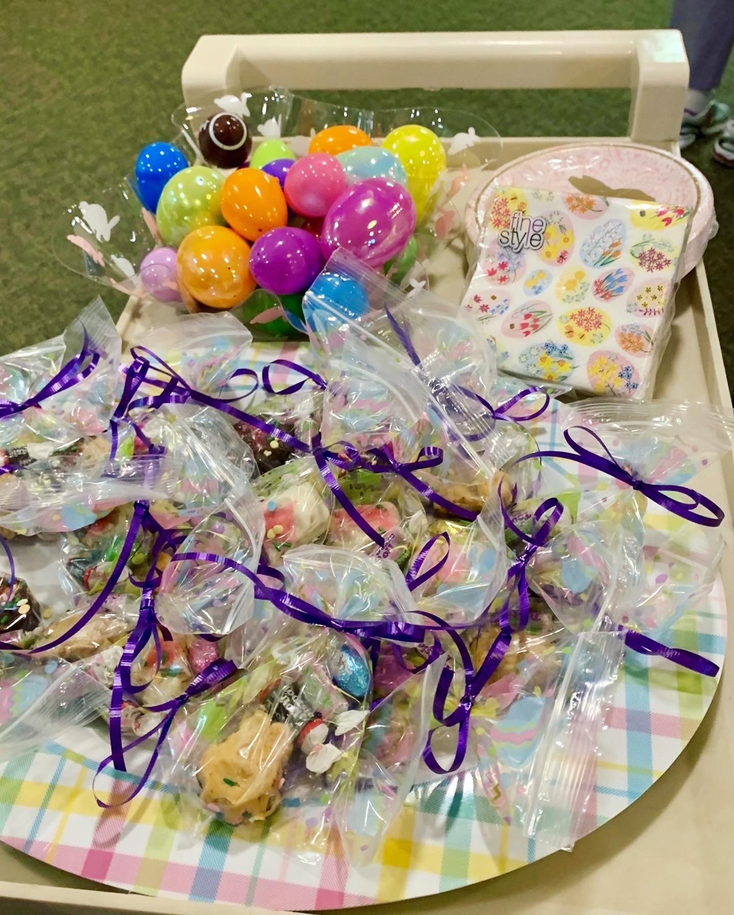 Colorful assortment of treats and decorations on a tray