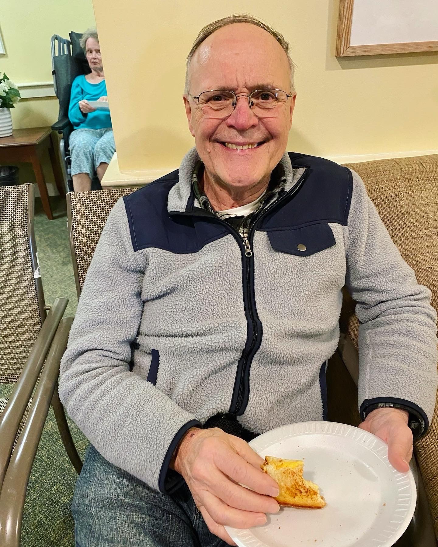 Resident enjoying food in a common area