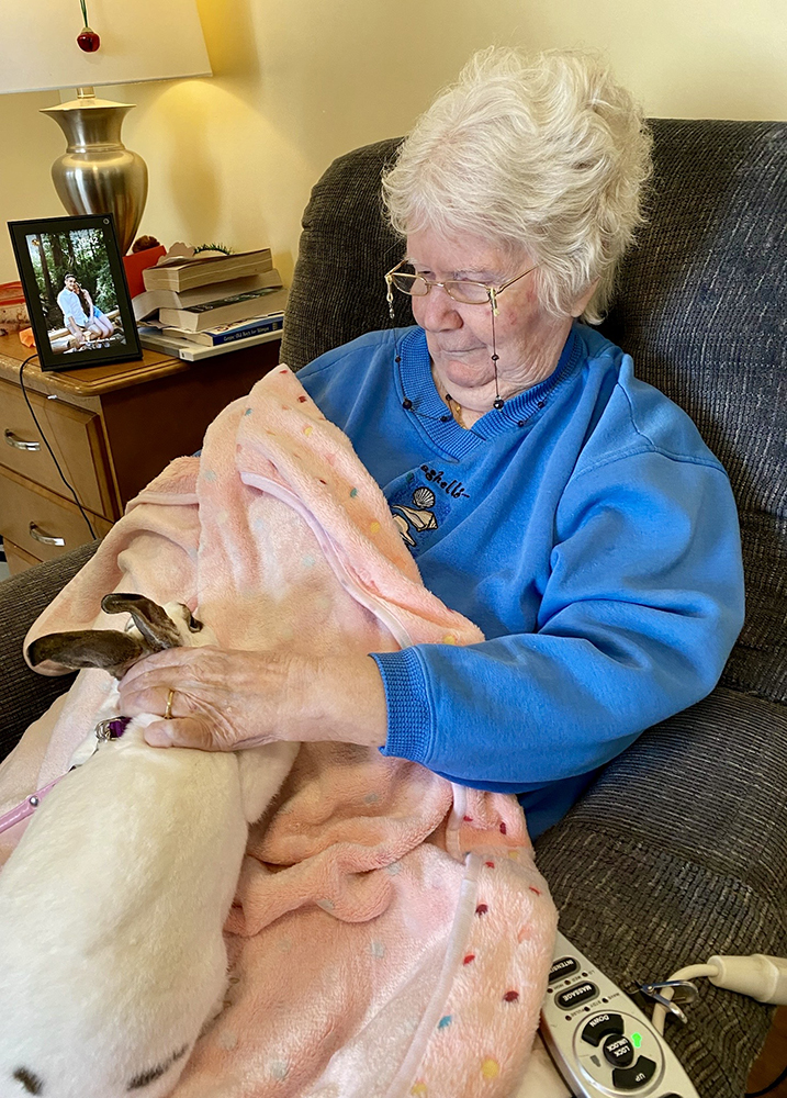 Resident enjoying time with a rabbit