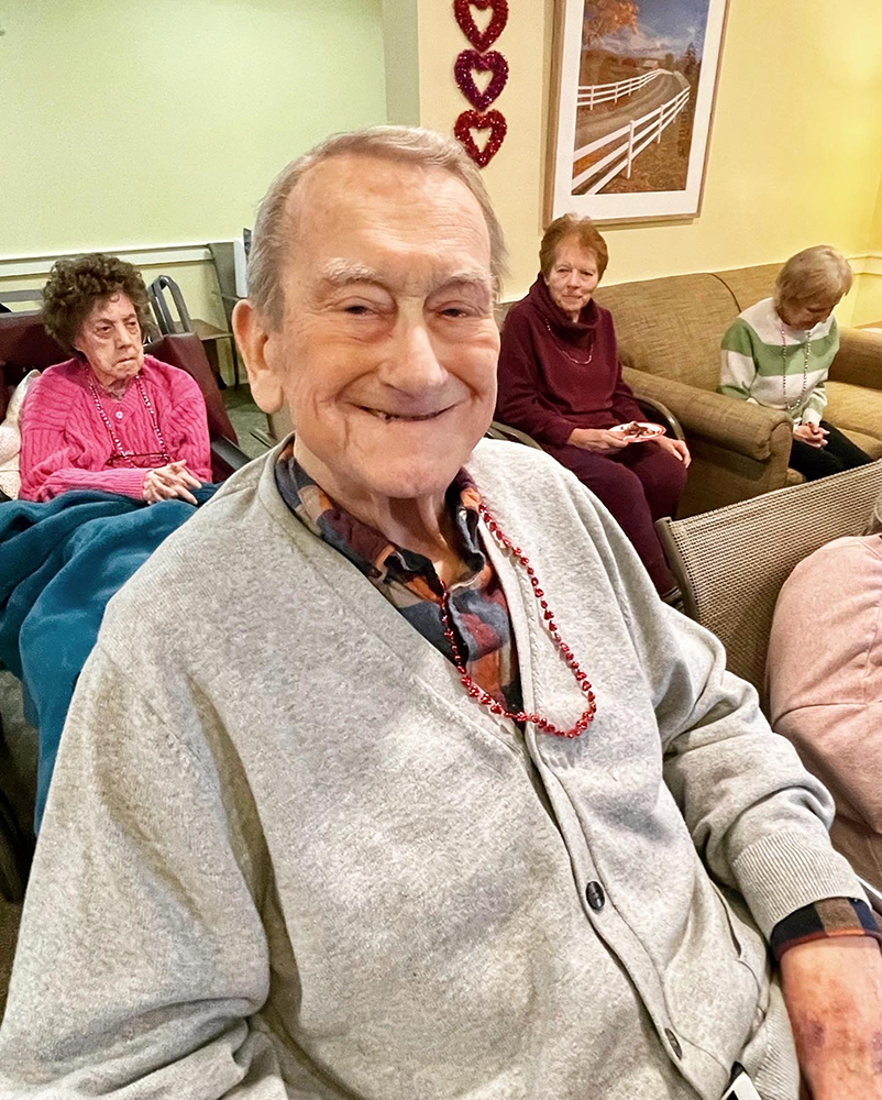 Residents enjoying a social gathering in the common area