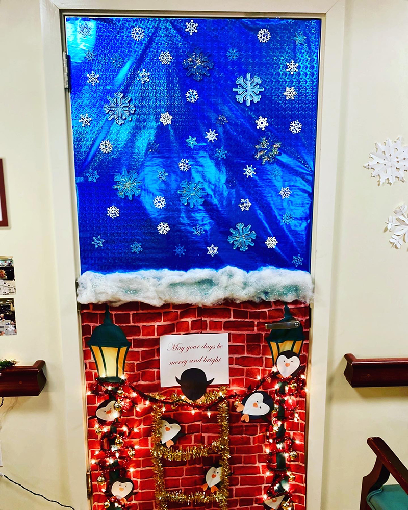 Festively decorated door with holiday theme