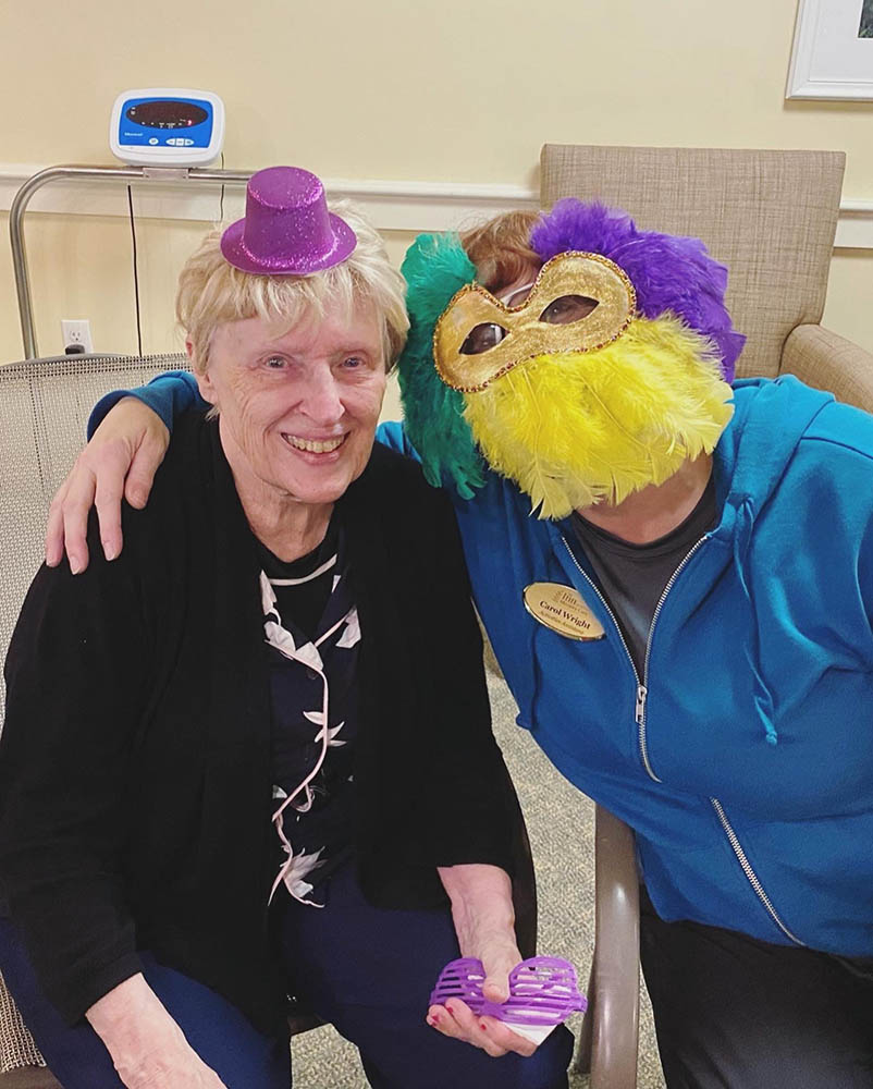 Residents celebrating with costumes and props