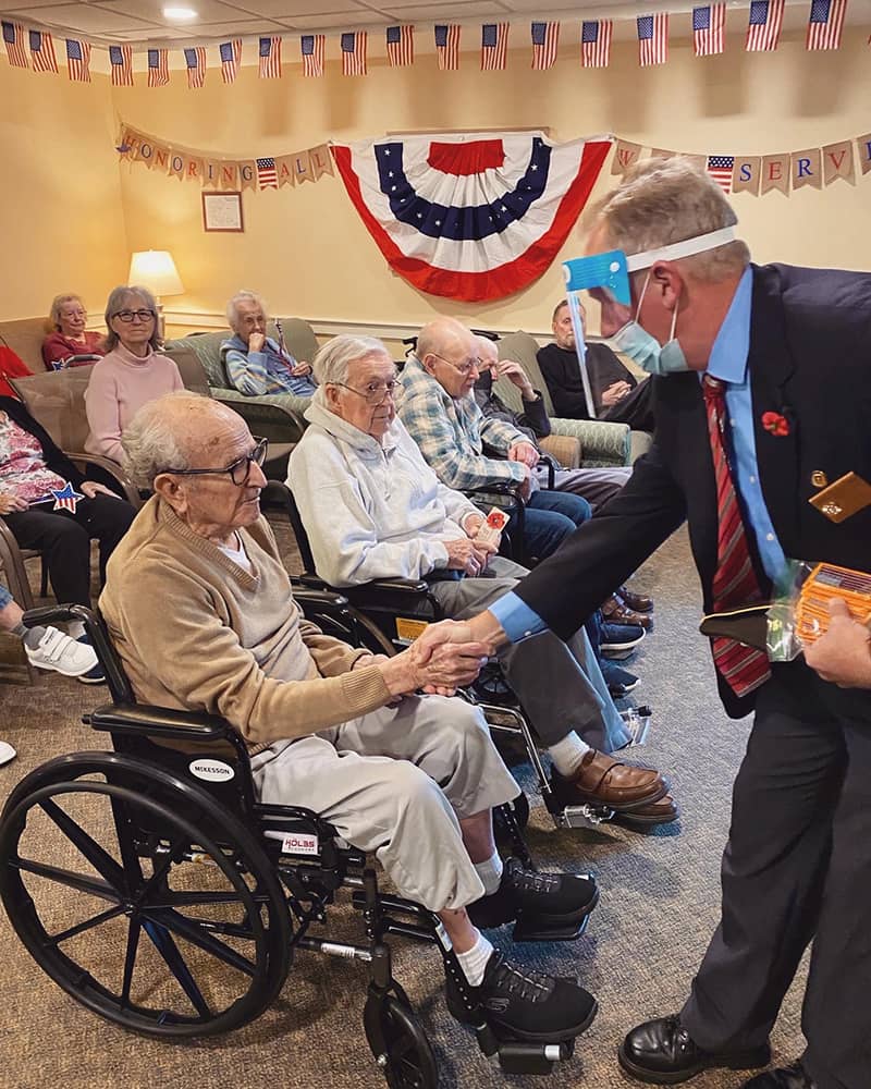 Residents engaged in a celebration with staff