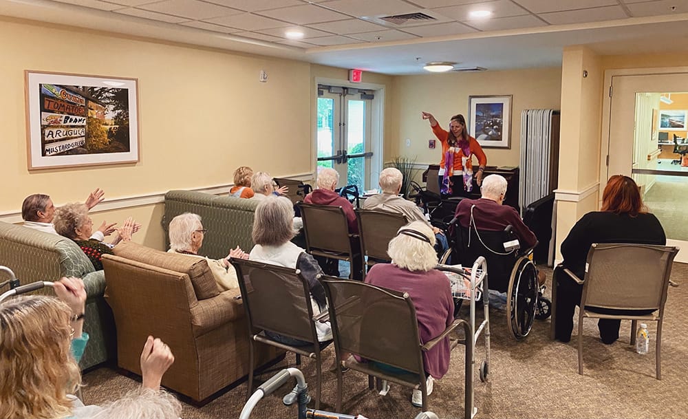 Residents participating in a group activity in a common area