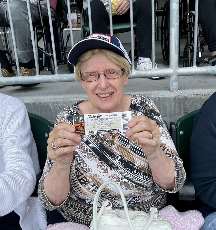 Resident enjoying a day out with a ticket