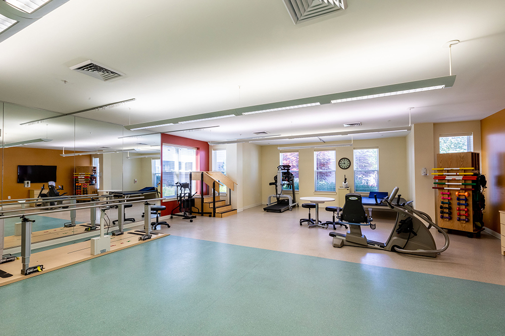 Physical therapy room with exercise equipment