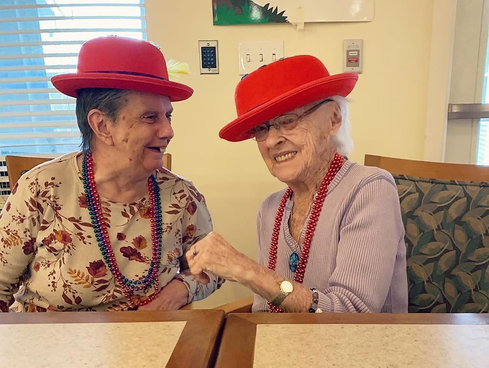 Residents laughing and enjoying a playful moment together