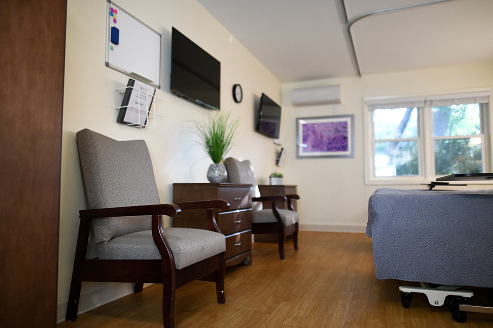 Cozy interior of a resident room with seating area