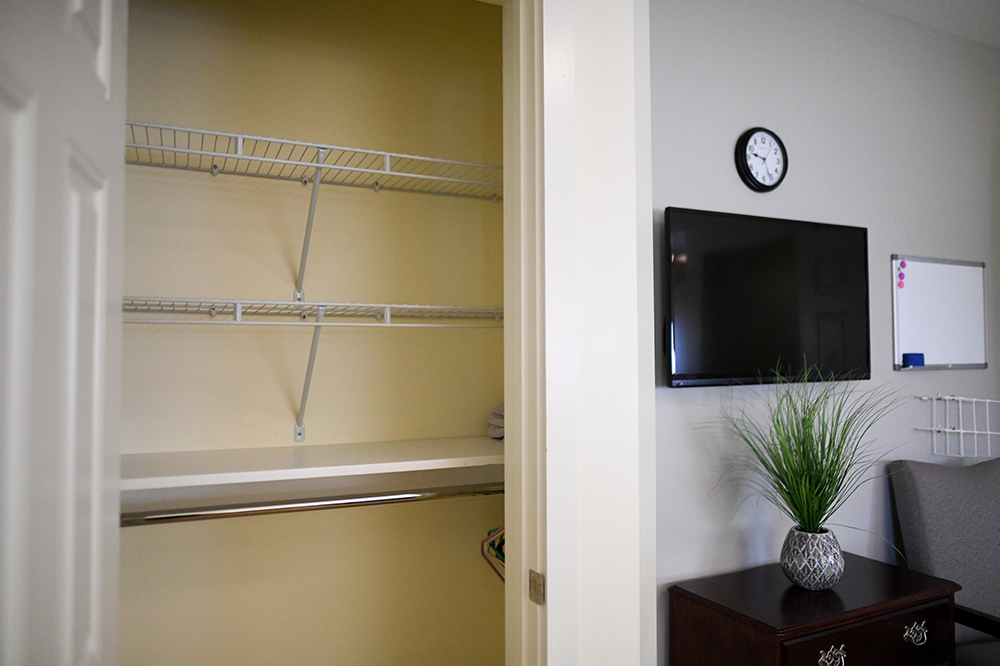 Interior view of a resident room with a television
