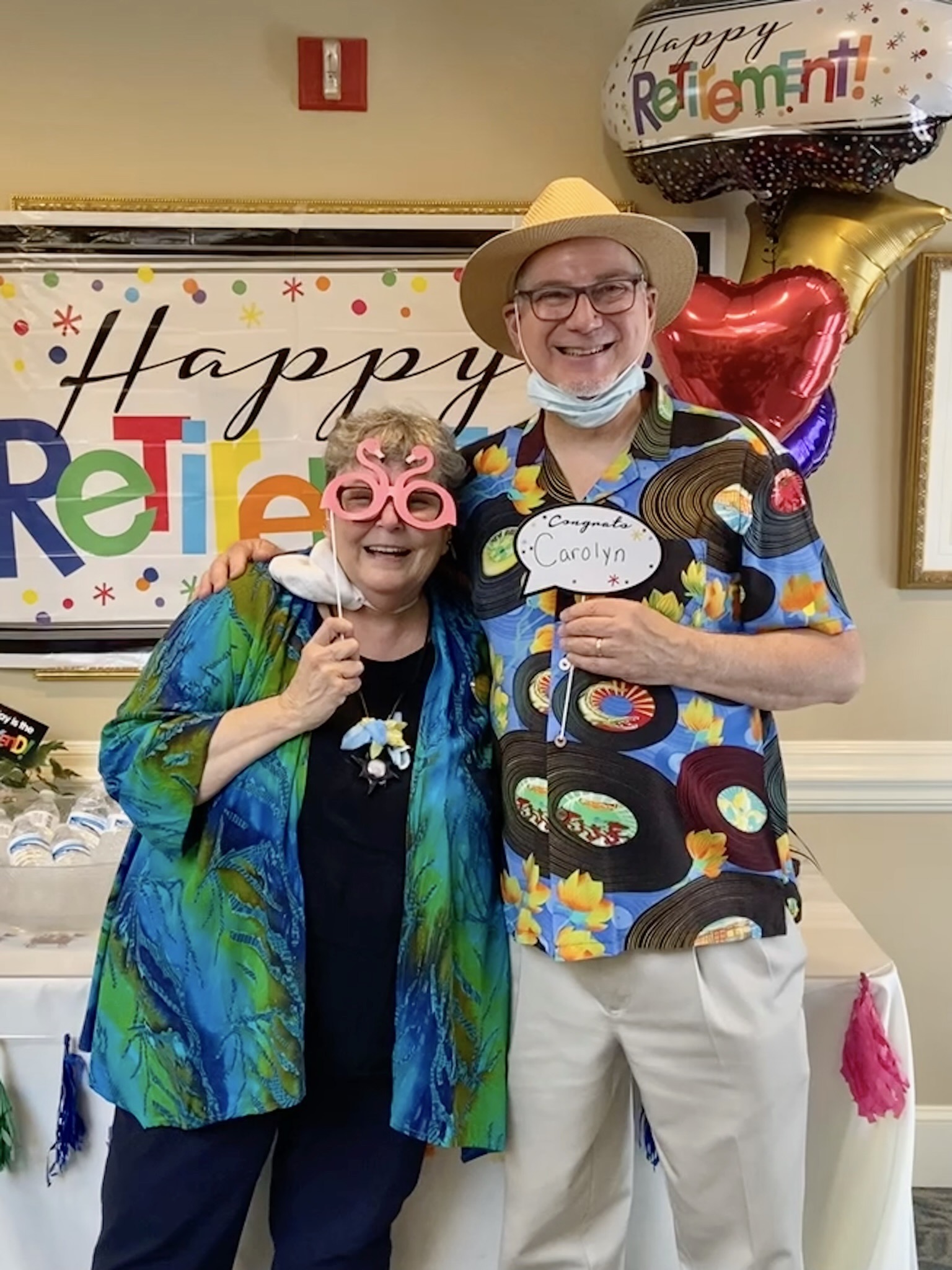Residents celebrating a retirement party with decorations