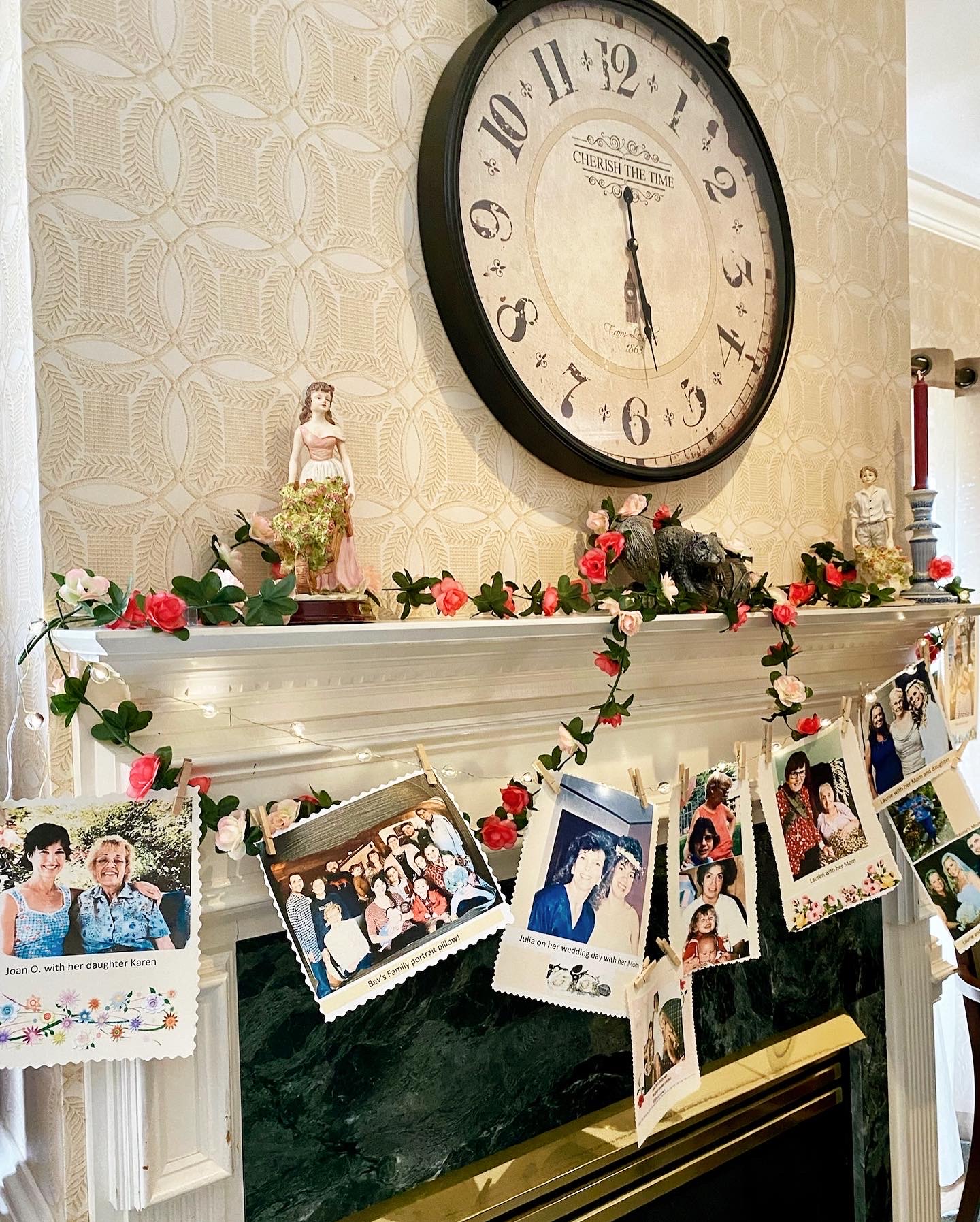 Decorative mantelpiece with personal photos and clock