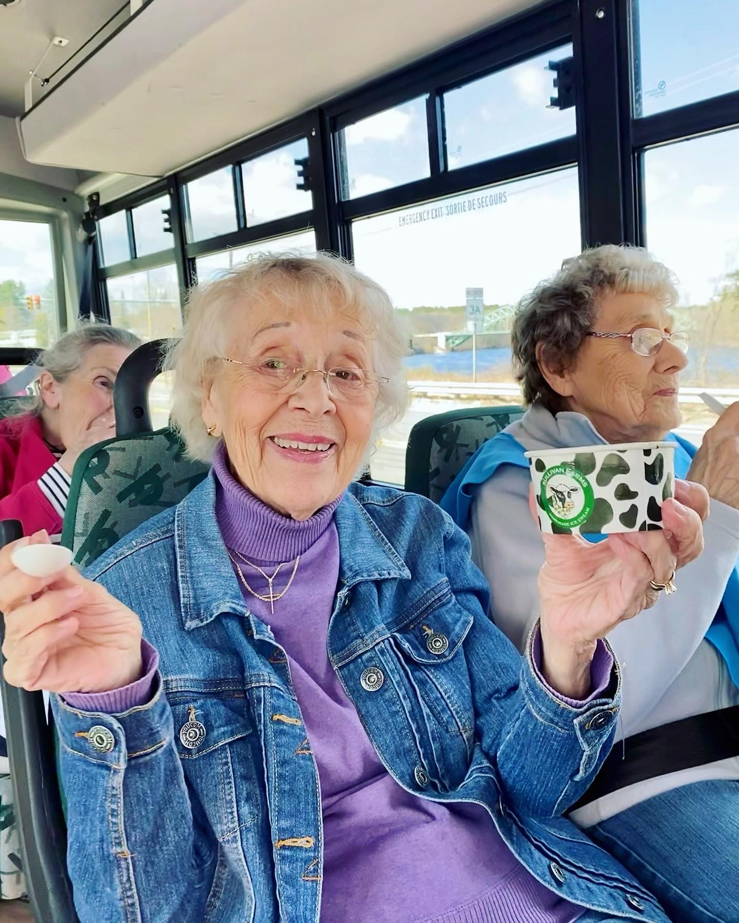 Residents enjoying a day out in a facility vehicle
