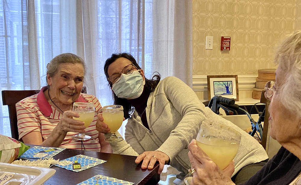 Residents enjoying drinks and celebrating together